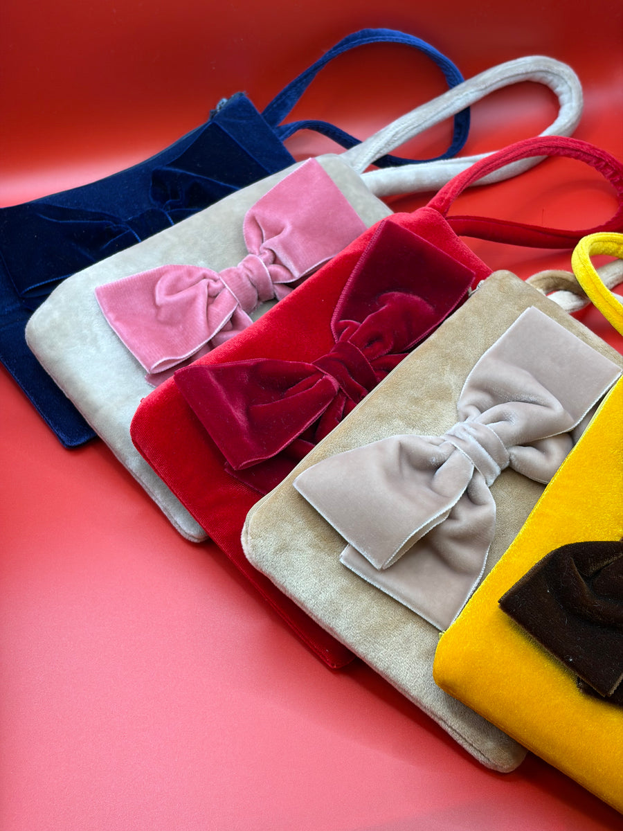Pochette in velluto mini con fiocco